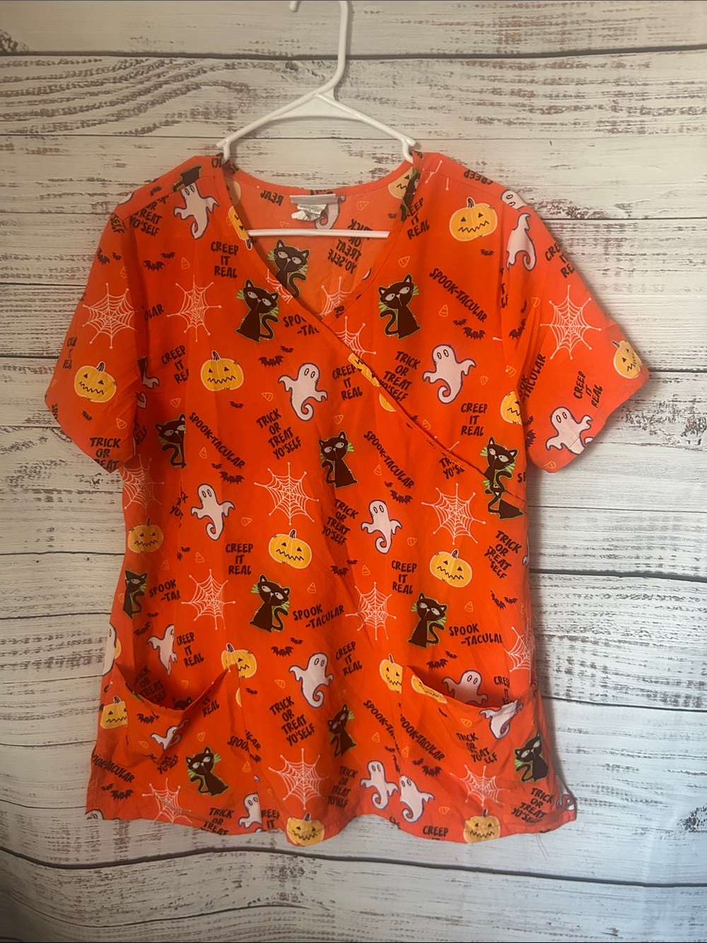 Orange halloween scrub top size large